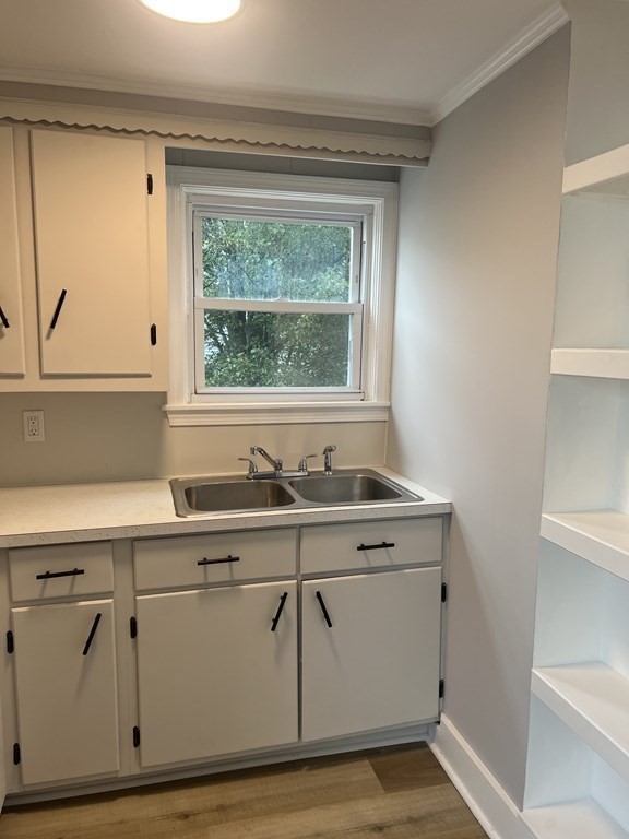 135 Snell Street Fall River, MA 02721 - Photo 8 of 29 a view with cabinets a sink and dishwasher
