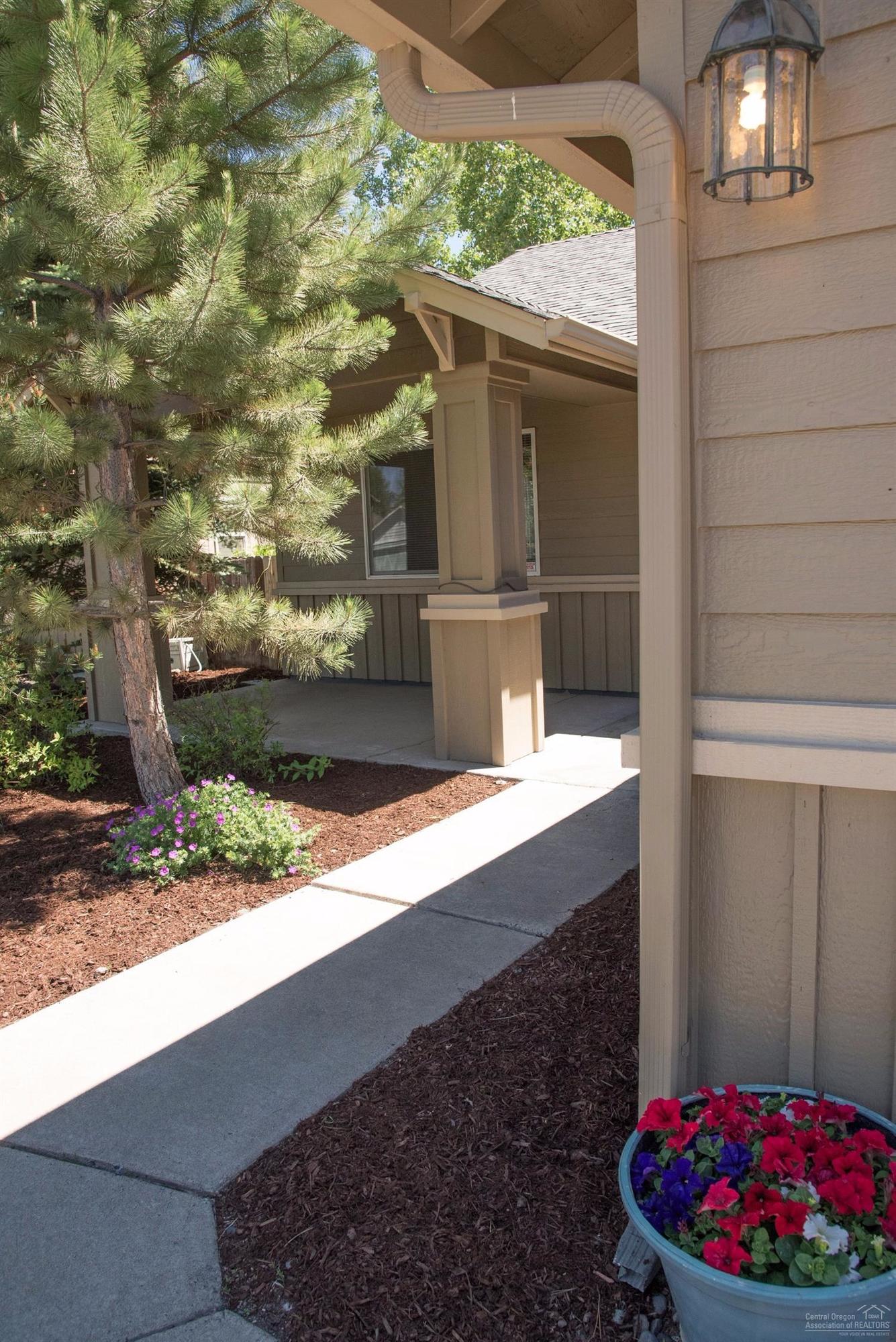 19967 Powers Road Bend, OR 97702 - Photo 3 of 22 Shady covered front porch.