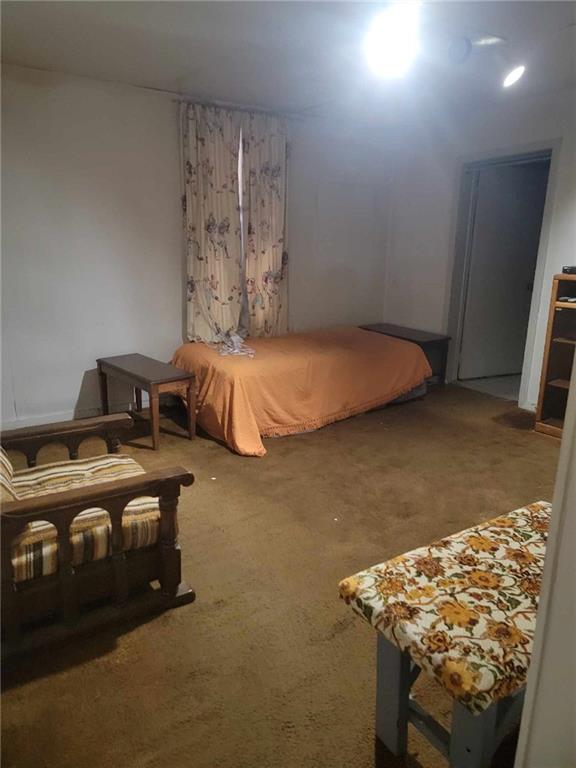 2191 Nilan Road Point Marion, PA 15474 - Photo 8 of 15 a bedroom with a bed and a dresser