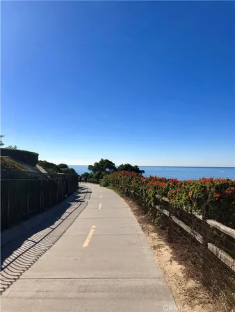 a living room with furniture window and wooden floor