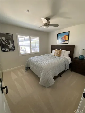 a view of a patio with chairs and a table