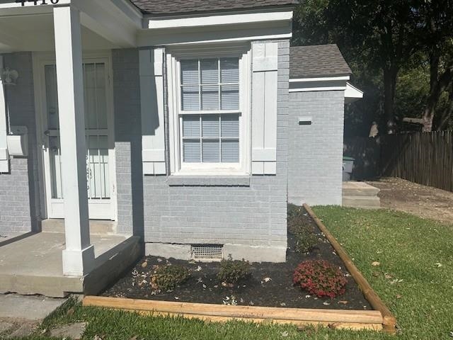 4416 Boyce Road Memphis, TN 38117 - Photo 9 of 22 View of side of property featuring brick siding, covered porch, and a shingled roof
