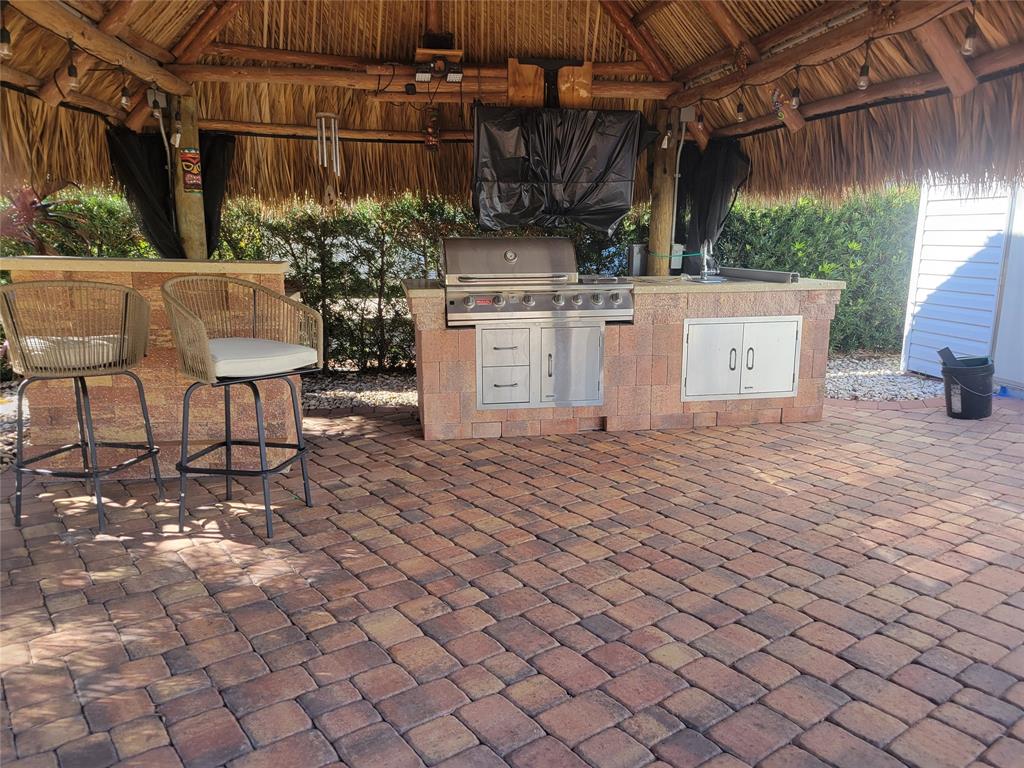 605 Southwest 40th Cove Okeechobee, FL 34974 - Photo 6 of 10 a view of a backyard