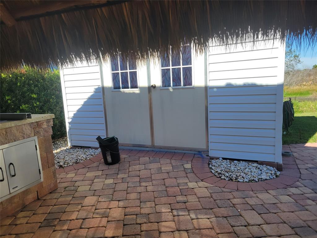 605 Southwest 40th Cove Okeechobee, FL 34974 - Photo 10 of 10 a view of a entryway door front of house