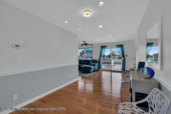 3125 Creek Road Toms River, NJ 08753 - Photo 17 of 60 a living room with furniture and a wooden floor