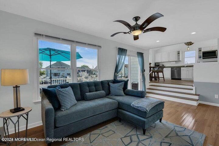 3125 Creek Road Toms River, NJ 08753 - Photo 19 of 60 a living room with furniture and a large window