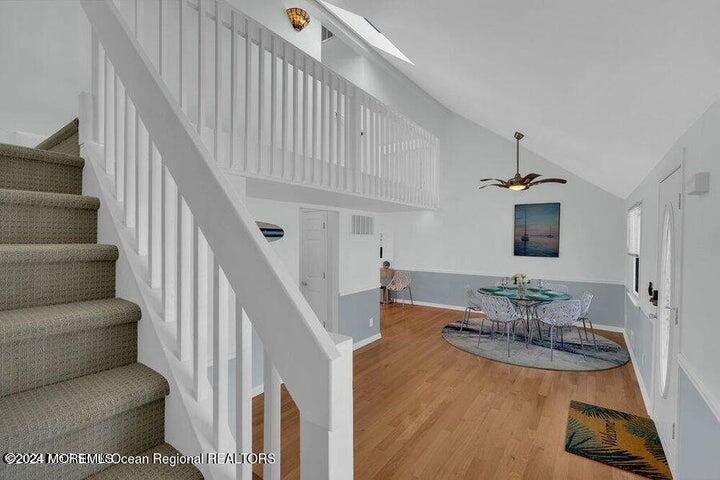 3125 Creek Road Toms River, NJ 08753 - Photo 27 of 60 a living room with furniture and a chandelier