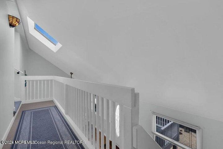 3125 Creek Road Toms River, NJ 08753 - Photo 28 of 60 a view of a hallway with stairs