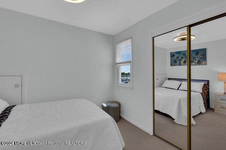 3125 Creek Road Toms River, NJ 08753 - Photo 29 of 60 a bedroom with a bed and a window