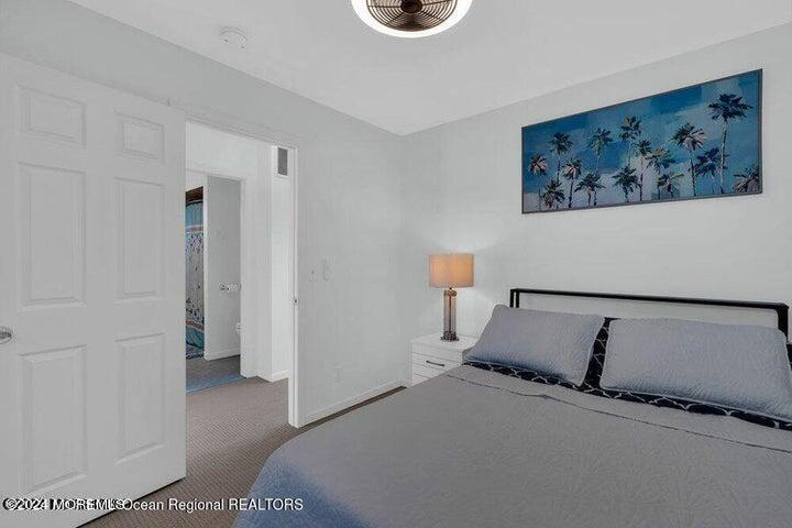 3125 Creek Road Toms River, NJ 08753 - Photo 30 of 60 a bedroom with a bed and a window