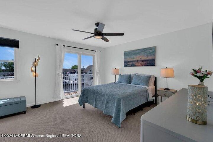 3125 Creek Road Toms River, NJ 08753 - Photo 31 of 60 a spacious bedroom with two beds and painted walls
