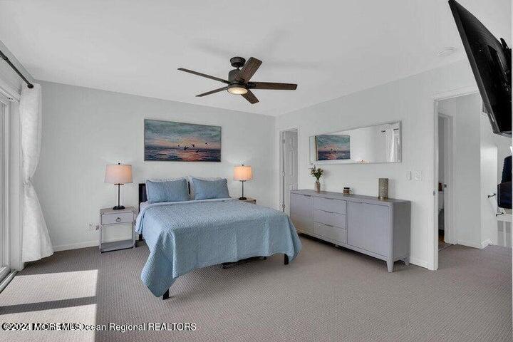 3125 Creek Road Toms River, NJ 08753 - Photo 33 of 60 a living room with furniture and a large window