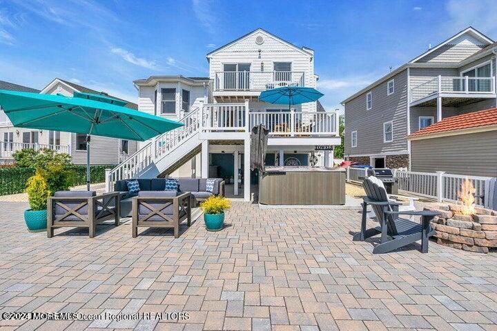 3125 Creek Road Toms River, NJ 08753 - Photo 39 of 60 a front view of a building with sitting area