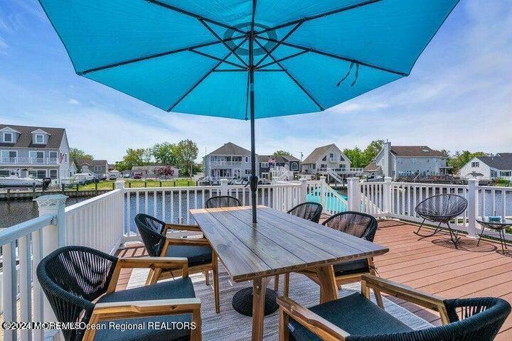 3125 Creek Road Toms River, NJ 08753 - Photo 44 of 60 a view of a roof deck with furniture