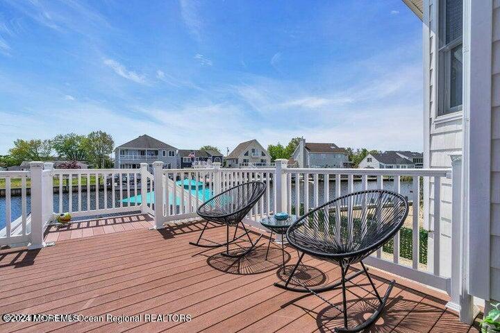 3125 Creek Road Toms River, NJ 08753 - Photo 45 of 60 a view of a chairs on wooden deck