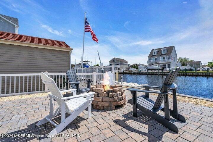 3125 Creek Road Toms River, NJ 08753 - Photo 46 of 60 a view of a terrace with seating area and furniture