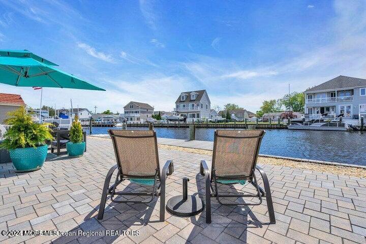3125 Creek Road Toms River, NJ 08753 - Photo 47 of 60 a chairs and table in a patio