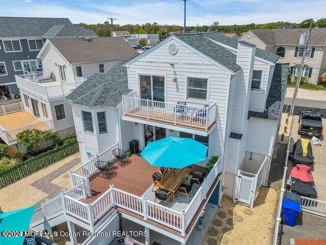 3125 Creek Road Toms River, NJ 08753 - Photo 53 of 60 a front view of a house with garden and furniture