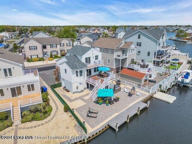 3125 Creek Road Toms River, NJ 08753 - Photo 57 of 60 an aerial view of residential houses with outdoor space and parking
