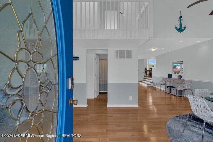 3125 Creek Road Toms River, NJ 08753 - Photo 9 of 60 a living room with furniture and wooden floor