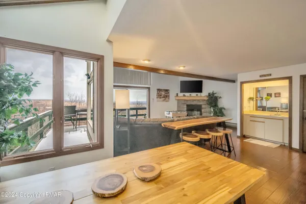 a terrace of a house with table and chairs
