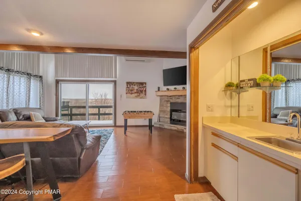 a bedroom with two beds and a window