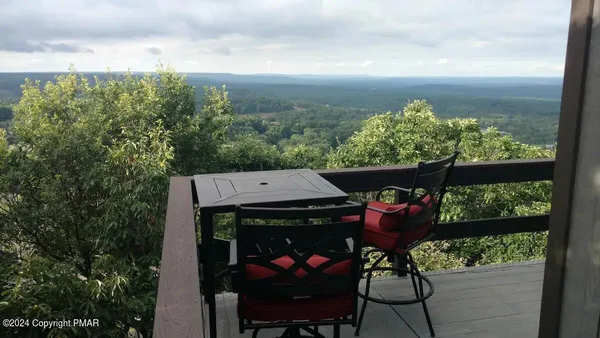 a kitchen with a sink appliances and cabinets