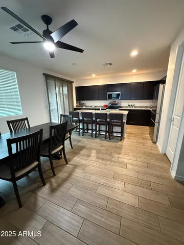 a view of kitchen with furniture and a rug