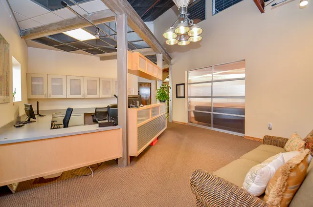 a view of a kitchen with furniture and a kitchen