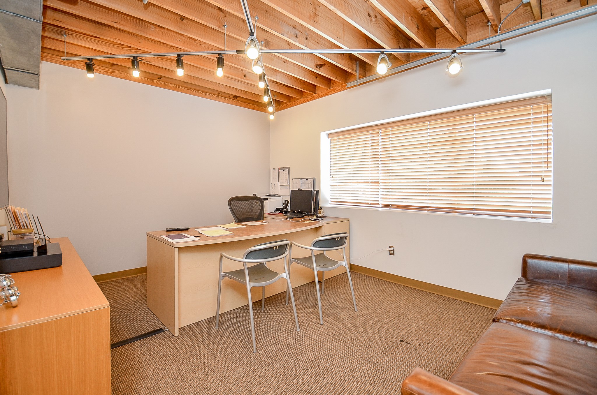 5712 Val Verde Street Houston, TX 77057 - Photo 29 of 50 a workspace with furniture and window