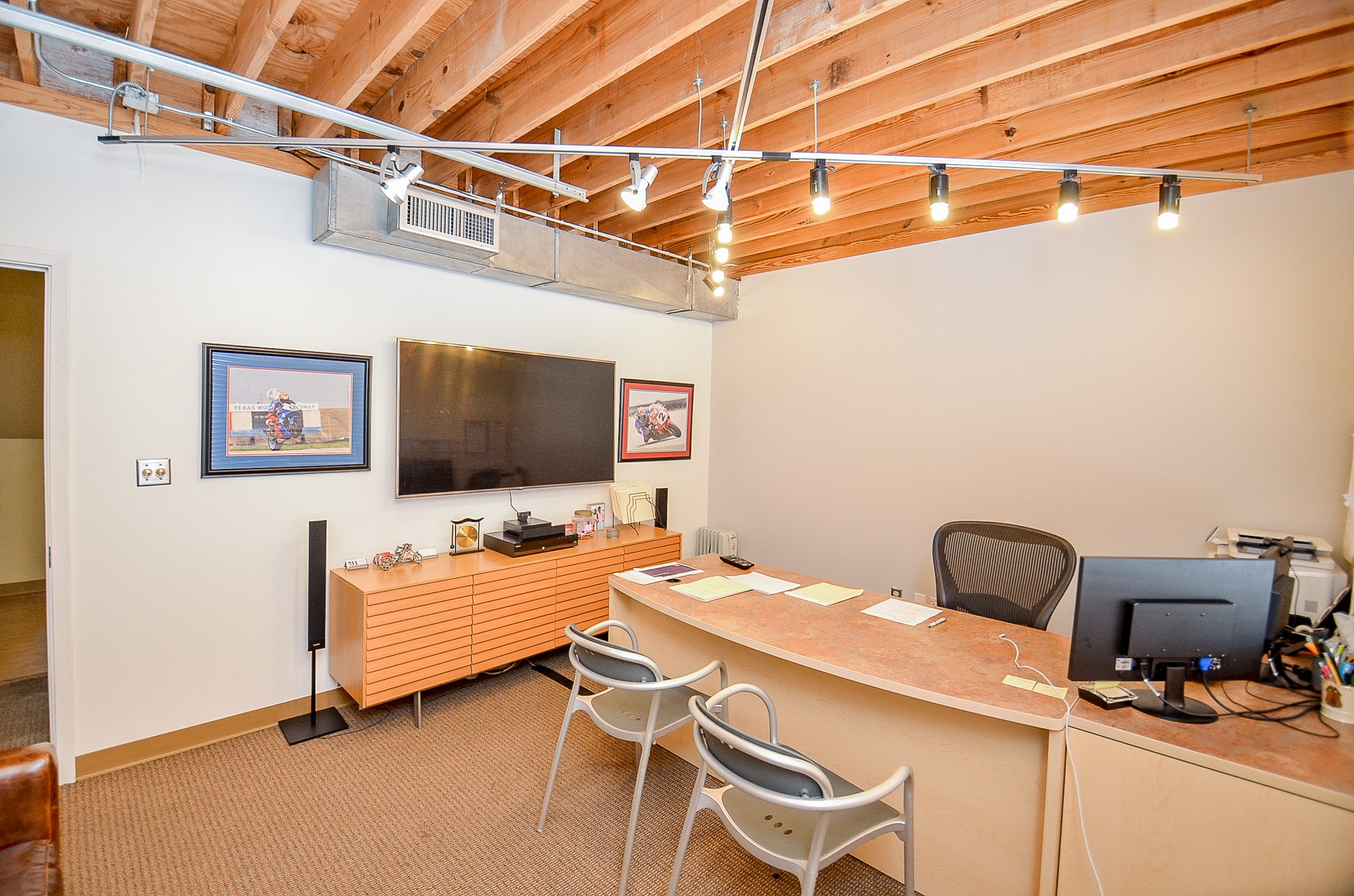 5712 Val Verde Street Houston, TX 77057 - Photo 31 of 50 a bedroom with a bed and a chair