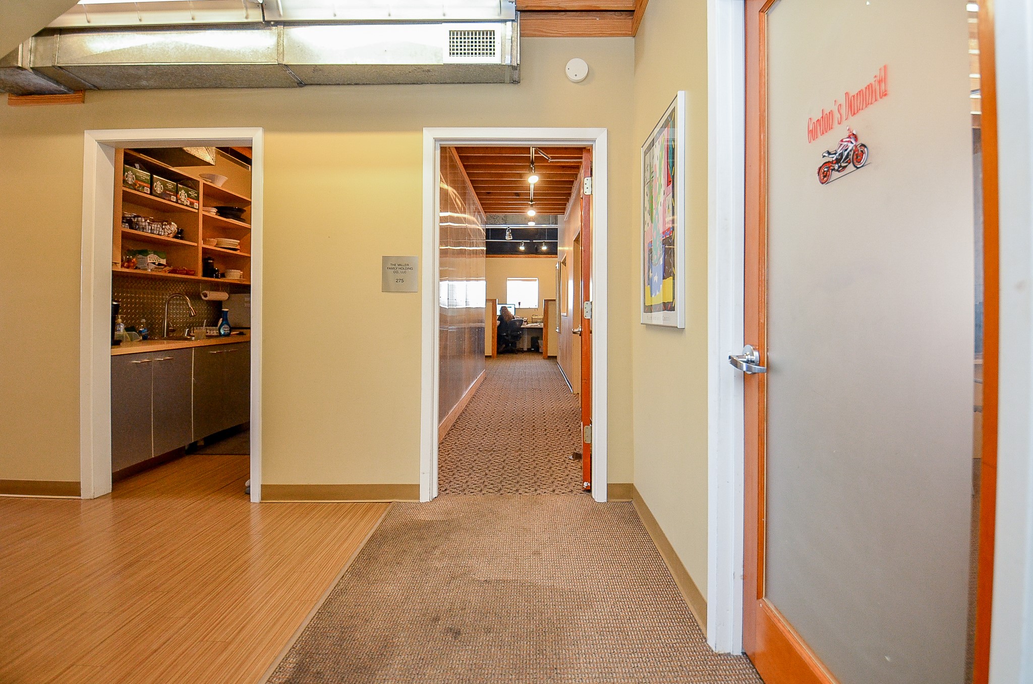 5712 Val Verde Street Houston, TX 77057 - Photo 37 of 50 a view of a hallway with wooden shelves