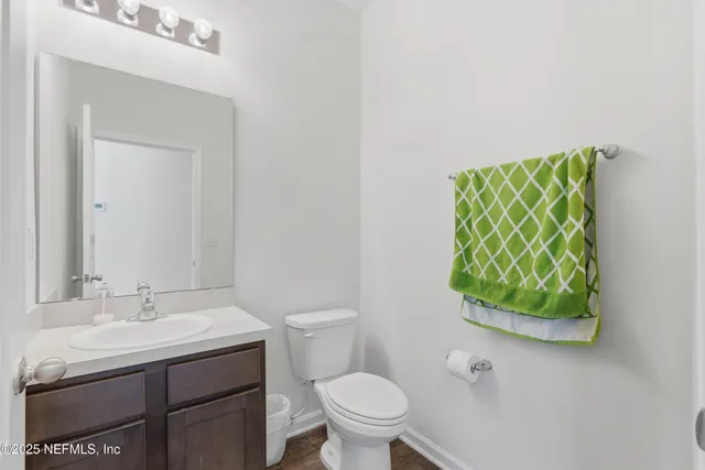 a bed room with a bed and a window