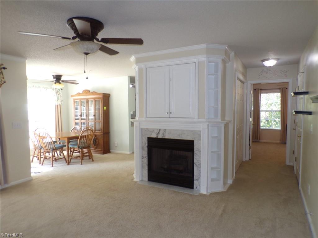 5005 Bass Chapel Road, Unit 1C Greensboro, NC 27455 - Photo 12 of 34 Living room, dining room, and 2nd bedroom