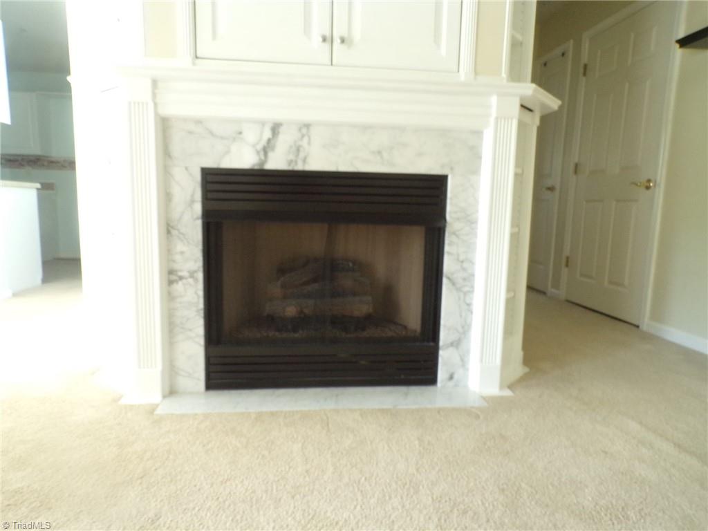 5005 Bass Chapel Road, Unit 1C Greensboro, NC 27455 - Photo 13 of 34 Gas log fireplace.