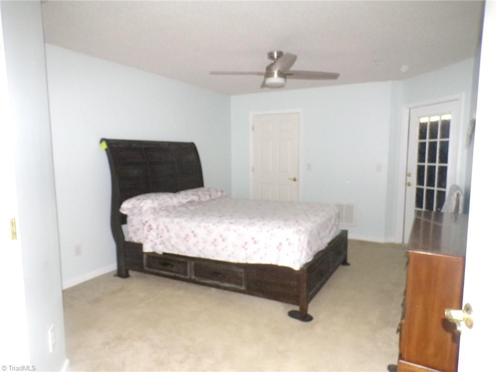 5005 Bass Chapel Road, Unit 1C Greensboro, NC 27455 - Photo 14 of 34 Primary Bedroom