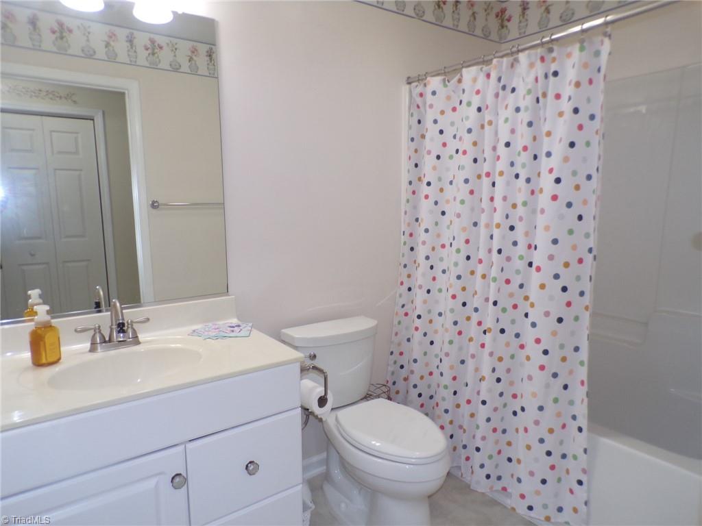 5005 Bass Chapel Road, Unit 1C Greensboro, NC 27455 - Photo 19 of 34 Hall full bath.