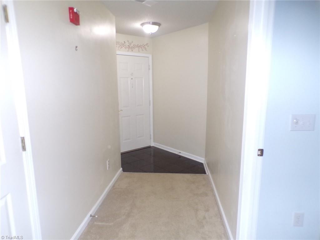 5005 Bass Chapel Road, Unit 1C Greensboro, NC 27455 - Photo 20 of 34 Front entrance door and foyer.