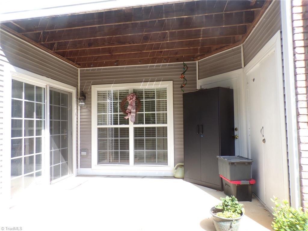 5005 Bass Chapel Road, Unit 1C Greensboro, NC 27455 - Photo 21 of 34 Enjoy your private covered porch.