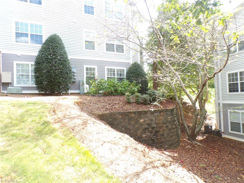 5005 Bass Chapel Road, Unit 1C Greensboro, NC 27455 - Photo 23 of 34 Right side view. This unit is on the bottom corner.