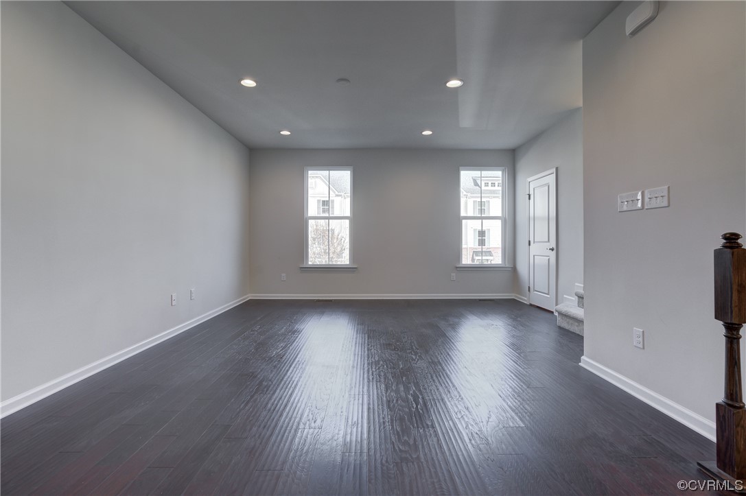 429 Crofton Village Terrace Midlothian, VA 23114 - Photo 15 of 35 an empty room with wooden floor and windows
