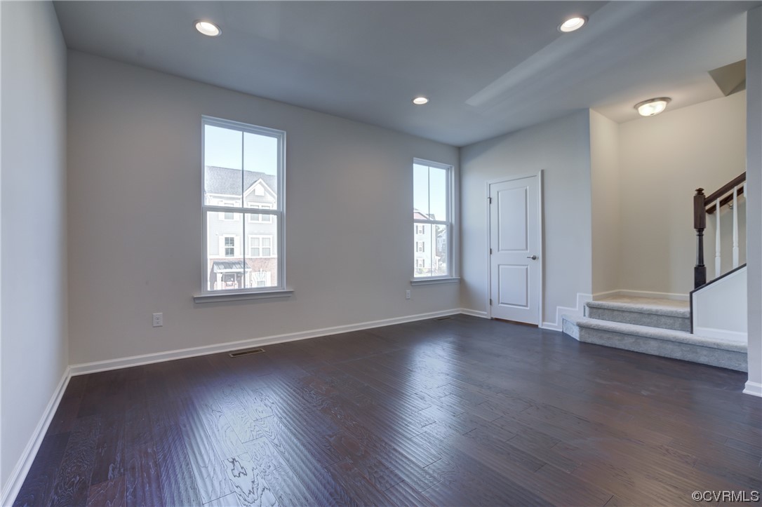 429 Crofton Village Terrace Midlothian, VA 23114 - Photo 16 of 35 an empty room with wooden floor and windows