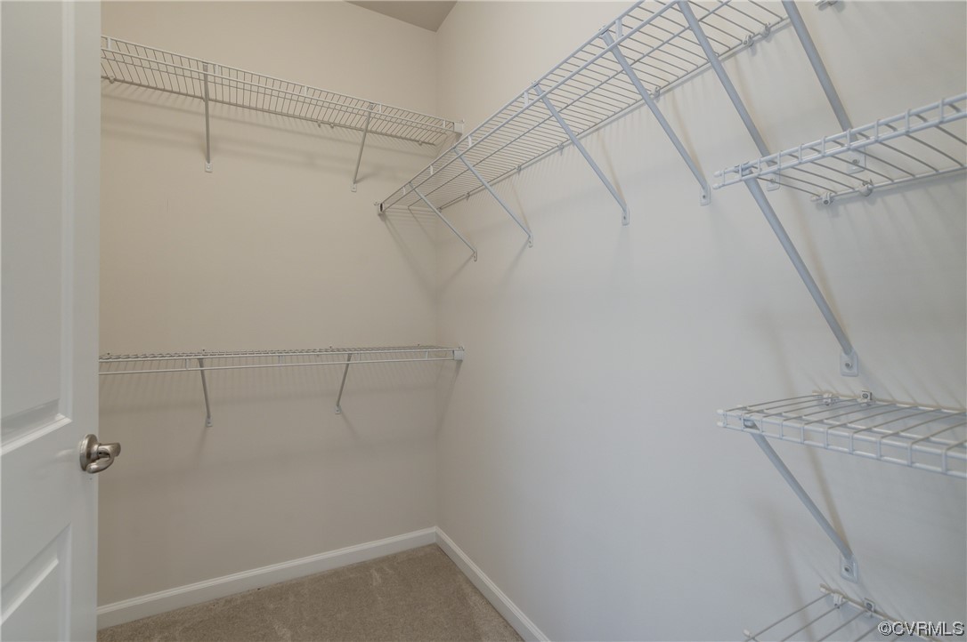 429 Crofton Village Terrace Midlothian, VA 23114 - Photo 20 of 35 a view of a room with racks on the wall