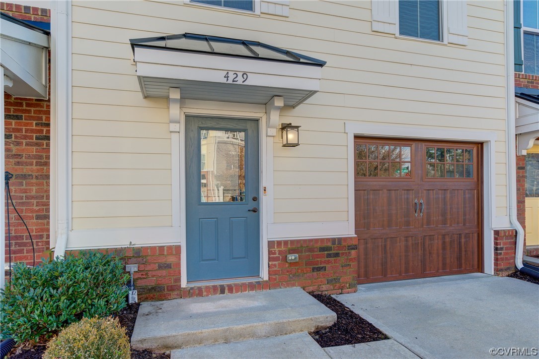 429 Crofton Village Terrace Midlothian, VA 23114 - Photo 2 of 35 a front view of a house