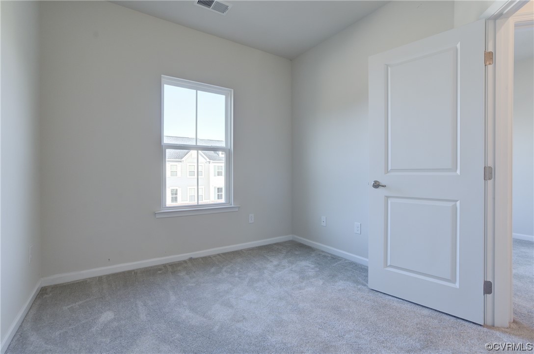 429 Crofton Village Terrace Midlothian, VA 23114 - Photo 23 of 35 an empty room with windows