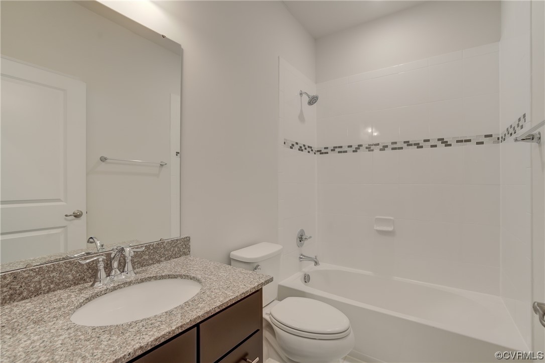 429 Crofton Village Terrace Midlothian, VA 23114 - Photo 25 of 35 a bathroom with a granite countertop sink toilet and shower