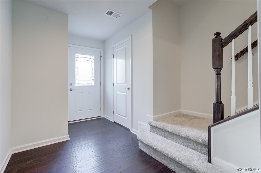 429 Crofton Village Terrace Midlothian, VA 23114 - Photo 4 of 35 an empty room with wooden floor and windows
