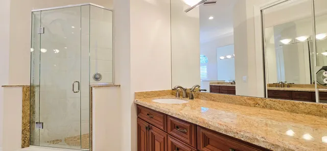 a view of a balcony with wooden floor