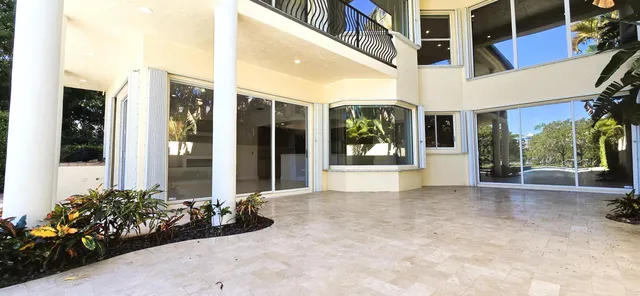 a view of a garden with patio