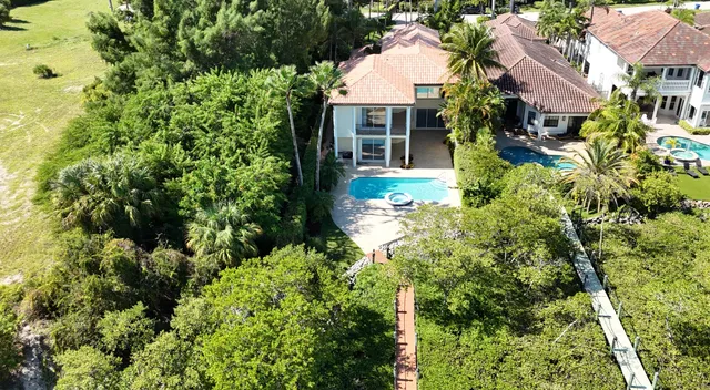 a balcony view with a couple of chairs